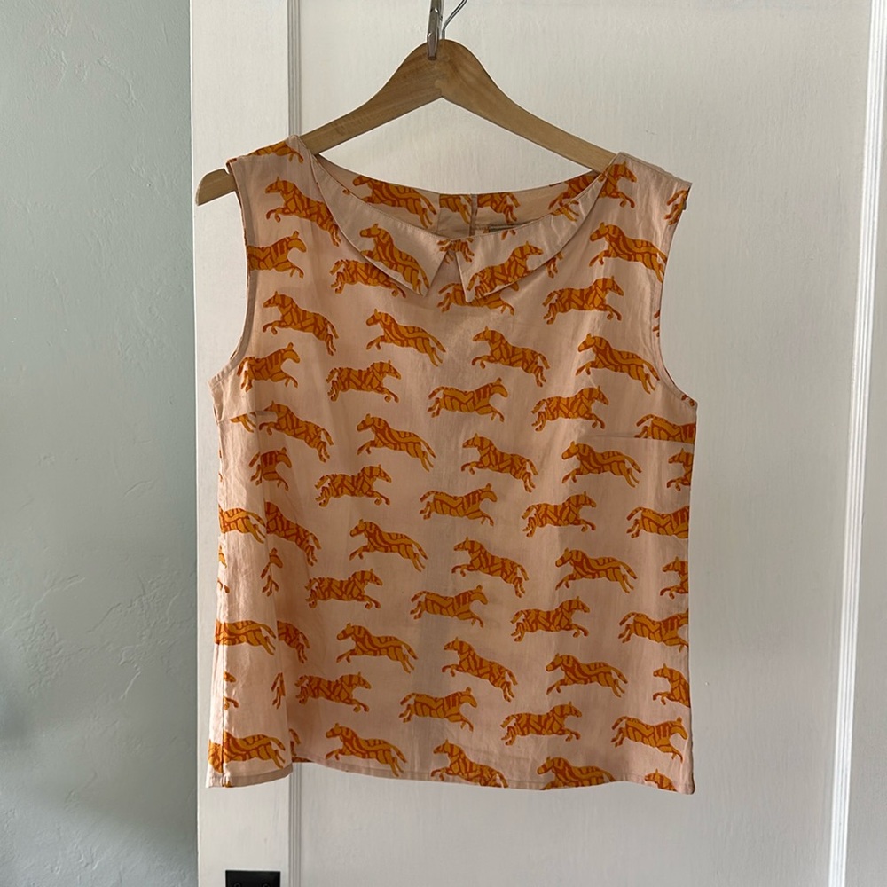 Anthropologie tank blouse with animal print. Size large